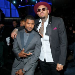 LOS ANGELES, CA - FEBRUARY 08: Recording artists Usher and Chris Brown attend The 57th Annual GRAMMY Awards at STAPLES Center on February 8, 2015 in Los Angeles, California.