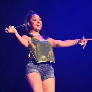 ATLANTA, GEORGIA - MAY 07: Yung Miami of City Girls performs onstage during the Strength Of A Woman Festival & Summit State Farm Arena Concert at State Farm Arena on May 07, 2022 in Atlanta, Georgia.